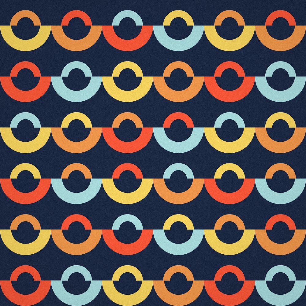 Hand-painted bright arcs on a navy ground